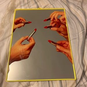 Seletti toilet paper lipstick mirror
